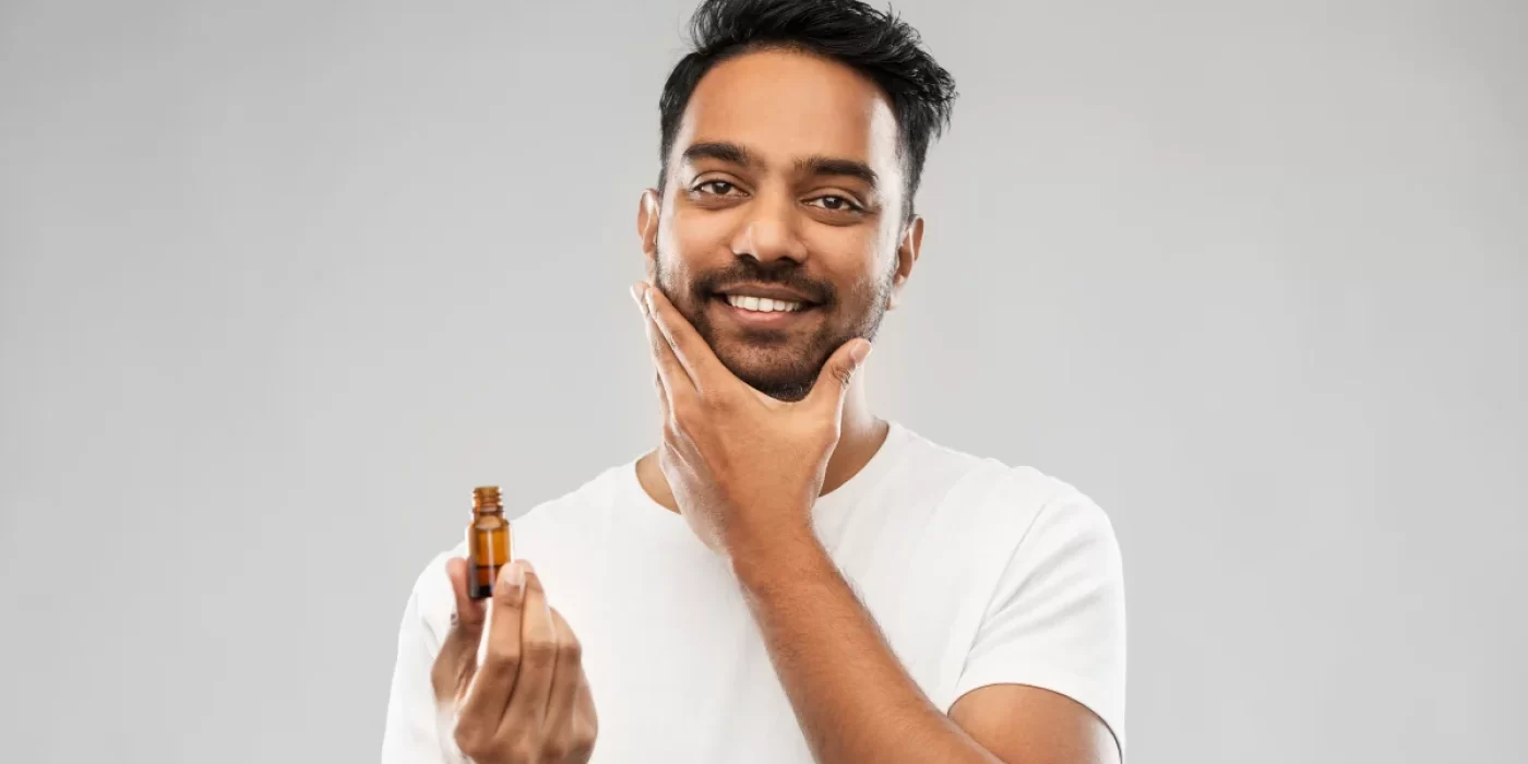 A man ready to use Shaving oil for sensitive skin